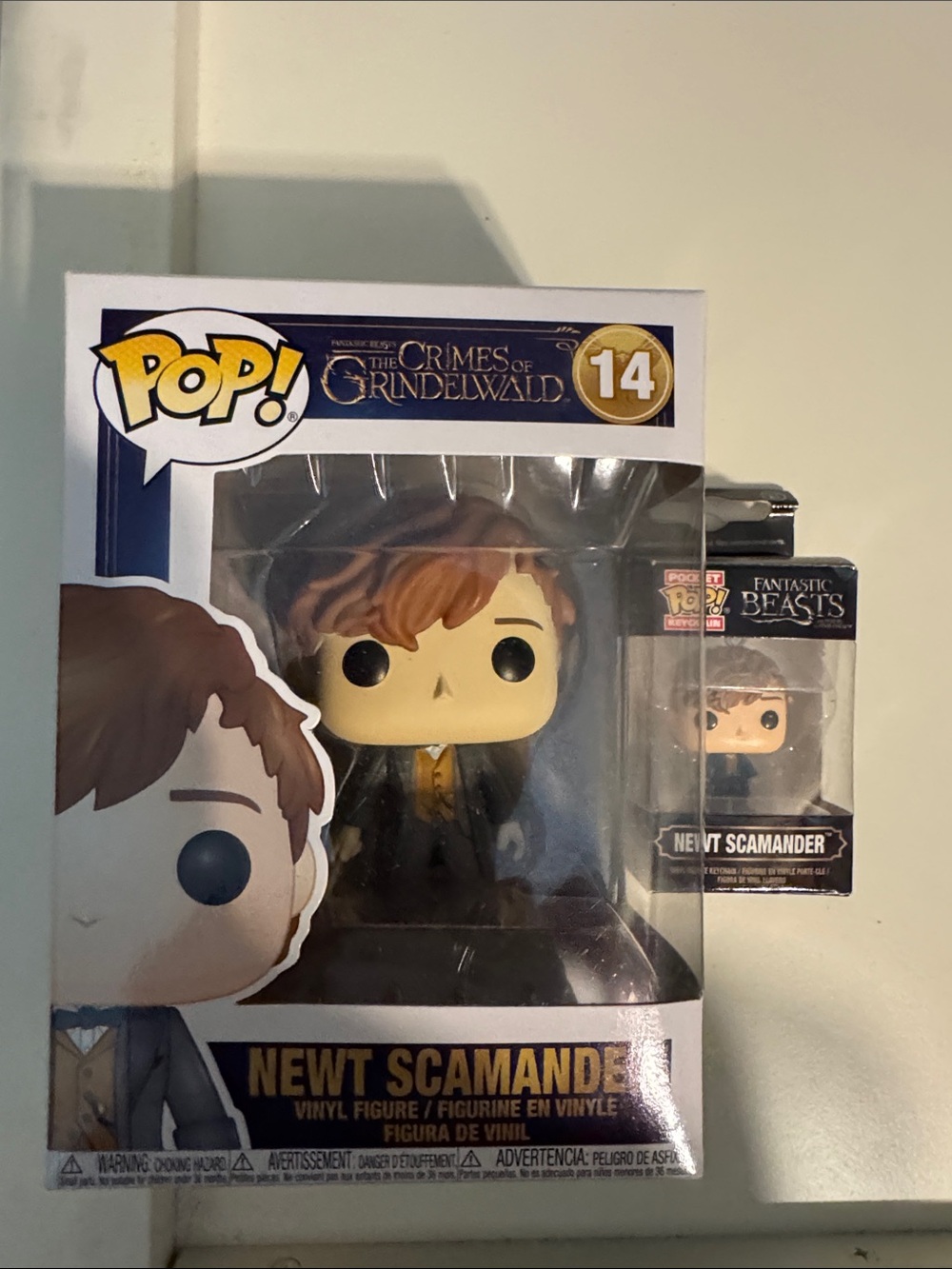 Funko Newt Scamander Figure with Brown Hair and Yellow Outfit